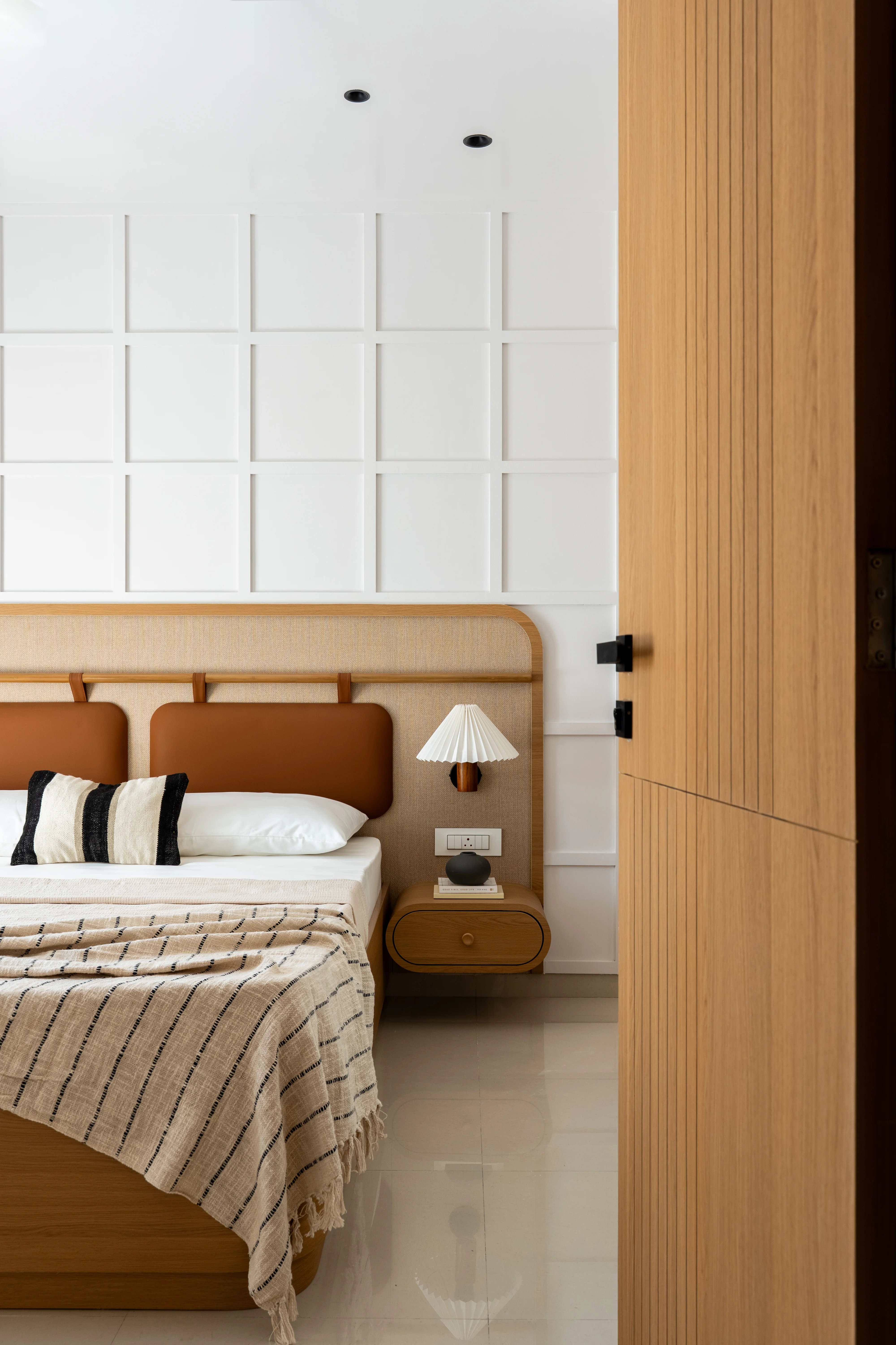 The Calm Nest — Dining area with warm, grounded finishes, studio raama, Pune